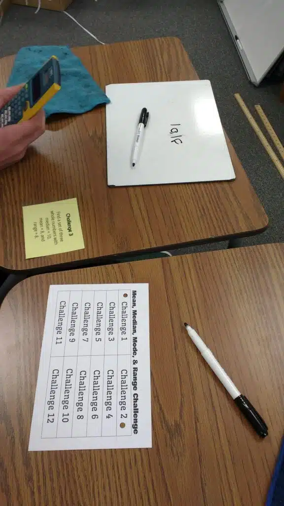 Student working on Challenge 3 of Mean Median Mode & Range Challenge