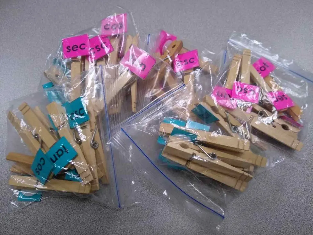 clothespins in bags on desk 