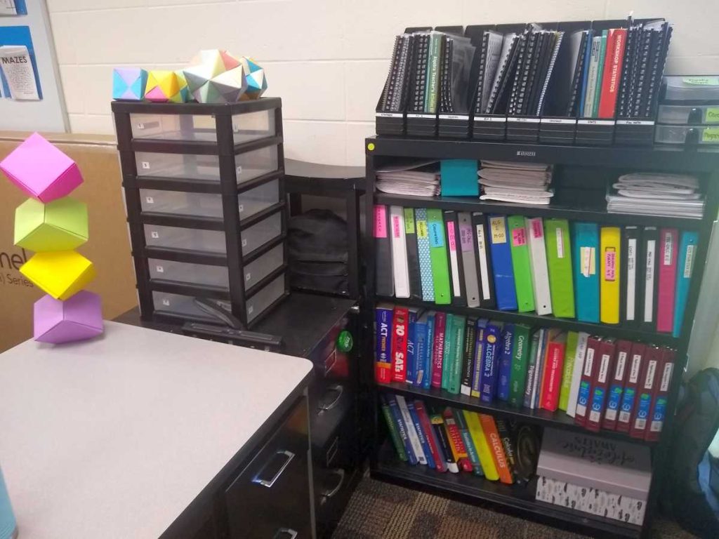 desk area in high school math classroom 