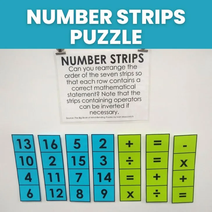 number strips puzzle hanging on dry erase board with magnets 