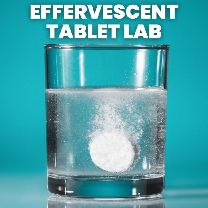 effervescent tablet fizzing in glass of water with text "effervescent tablet lab" 