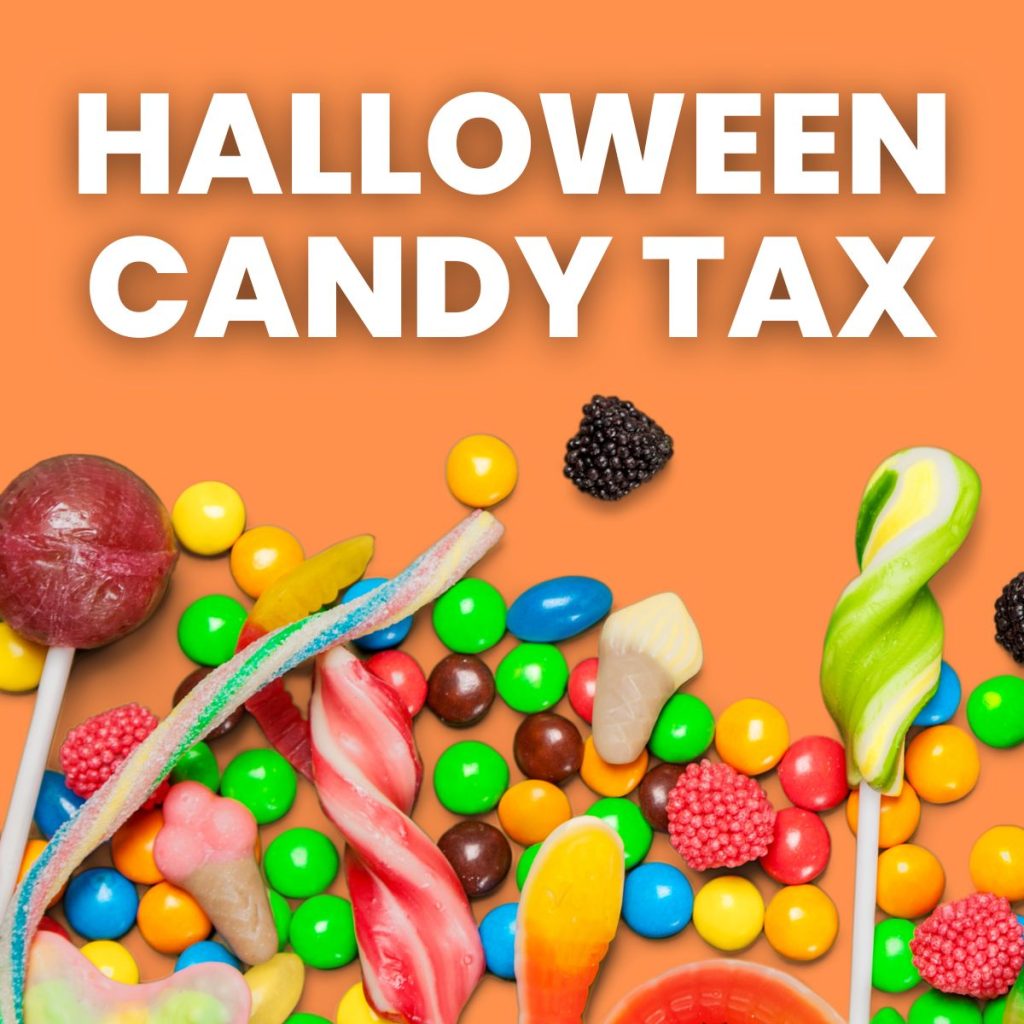 photograph of candy on orange background with text of "halloween candy tax" 