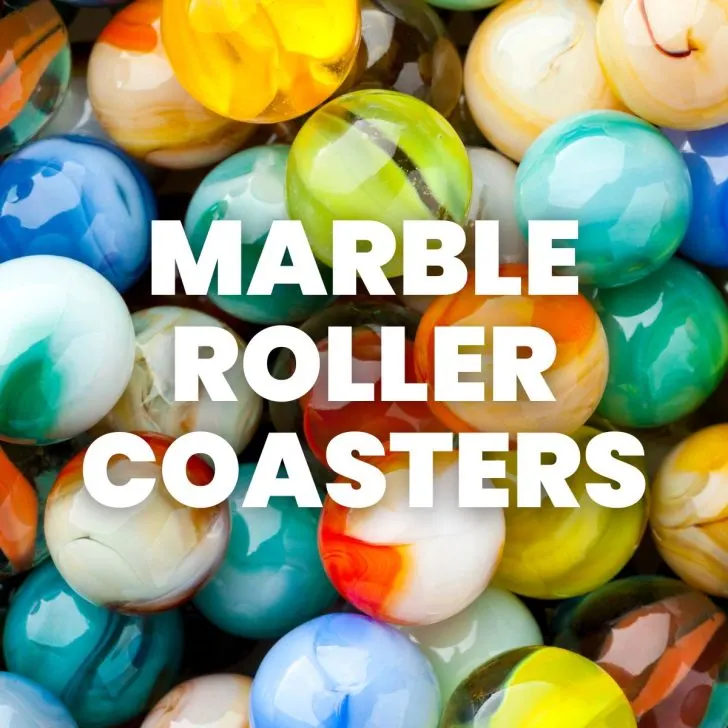 close-up of marbles with text of "marble roller coasters" 