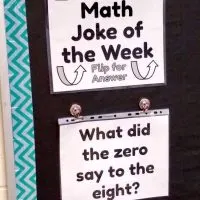 math joke of the week posters hanging on bulletin board in high school math classroom 