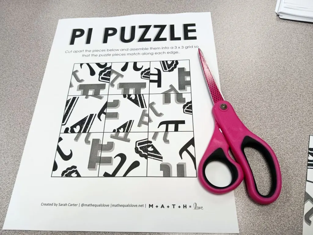 pi puzzle printout with scissors laying on top 