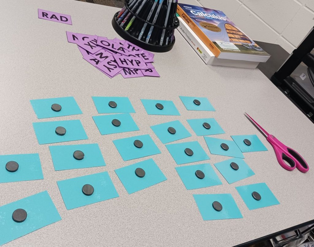 magnets placed on the back of math triples puzzle pieces 
