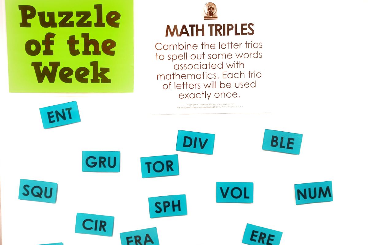 Poster including instructions to math triples puzzle next to poster which reads "puzzle of the week" 