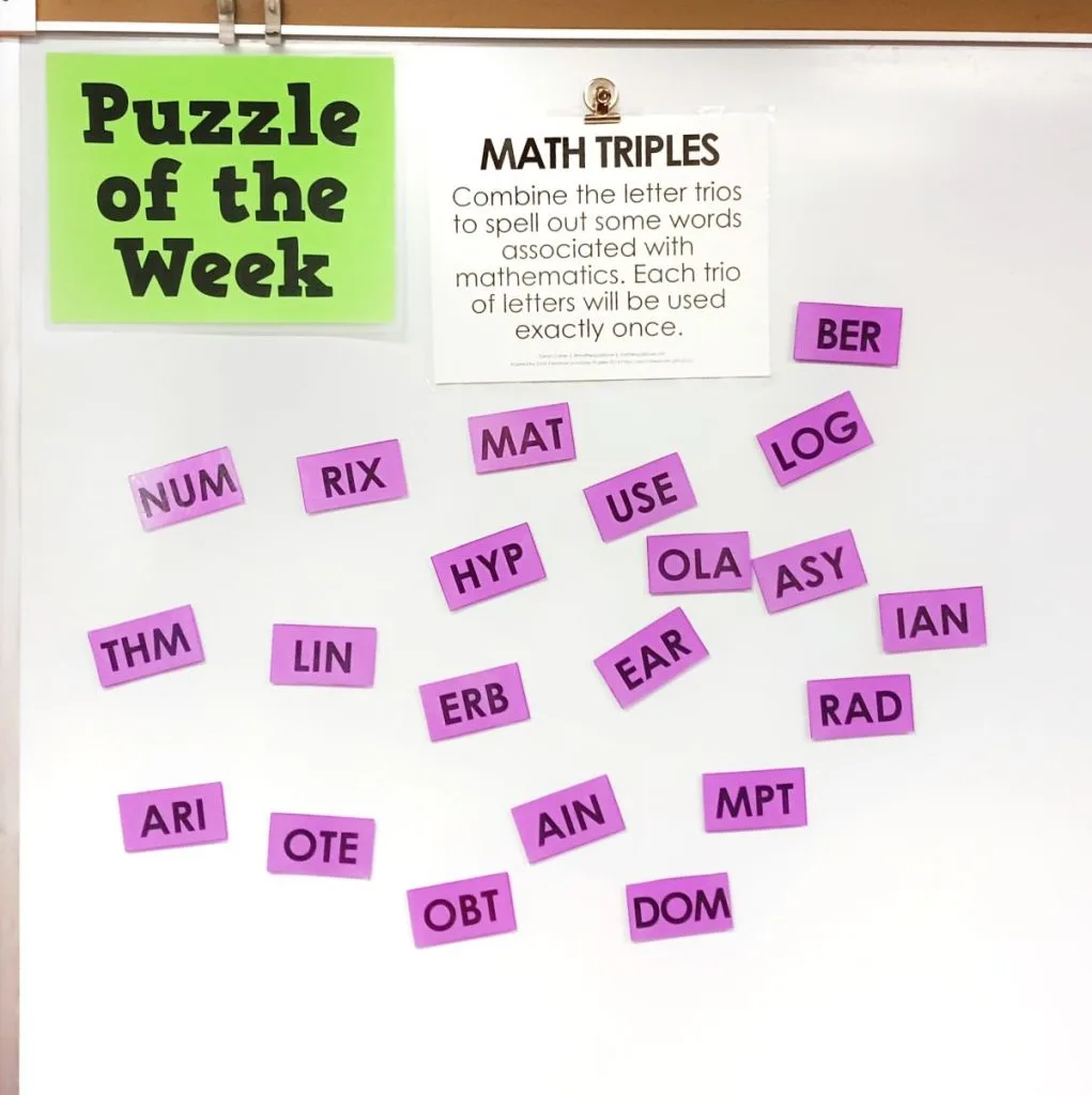advanced level of math triples puzzle hanging on dry erase board 