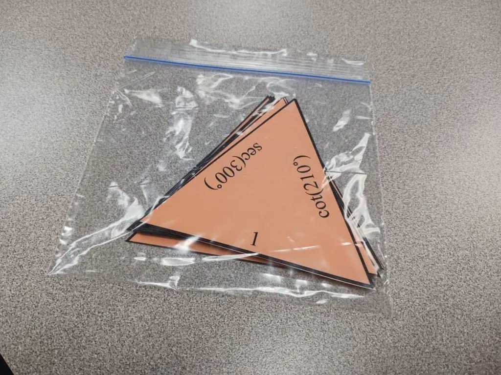 cut apart triangles for evaluating trig functions puzzle in ziplock bag 