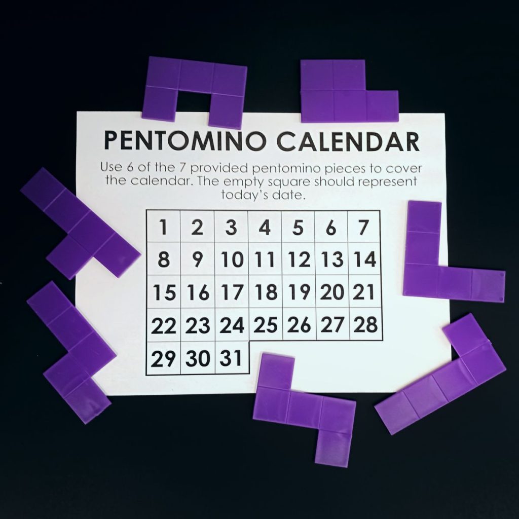 pentomino calendar puzzle with 7 pentomino pieces surrounding it 