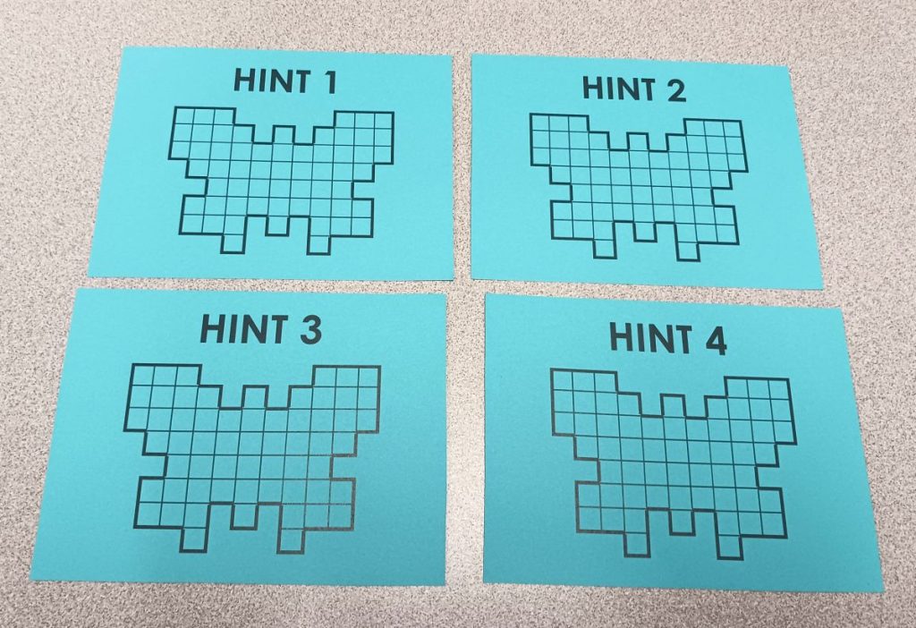 set of four hint cards for pentominoes butterfly puzzle