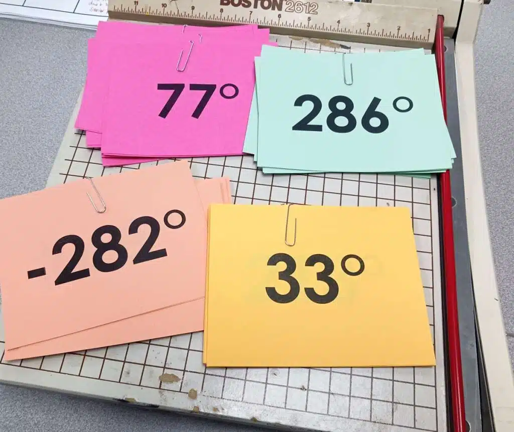 stacks of cards for trig reference angles activity called odd one out 