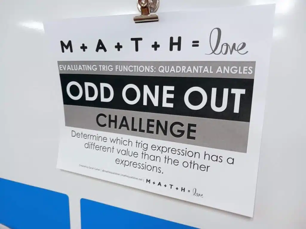 instructions for evaluating trig functions of quadrantal angles activity hanging on dry erase board in high school math classroom 