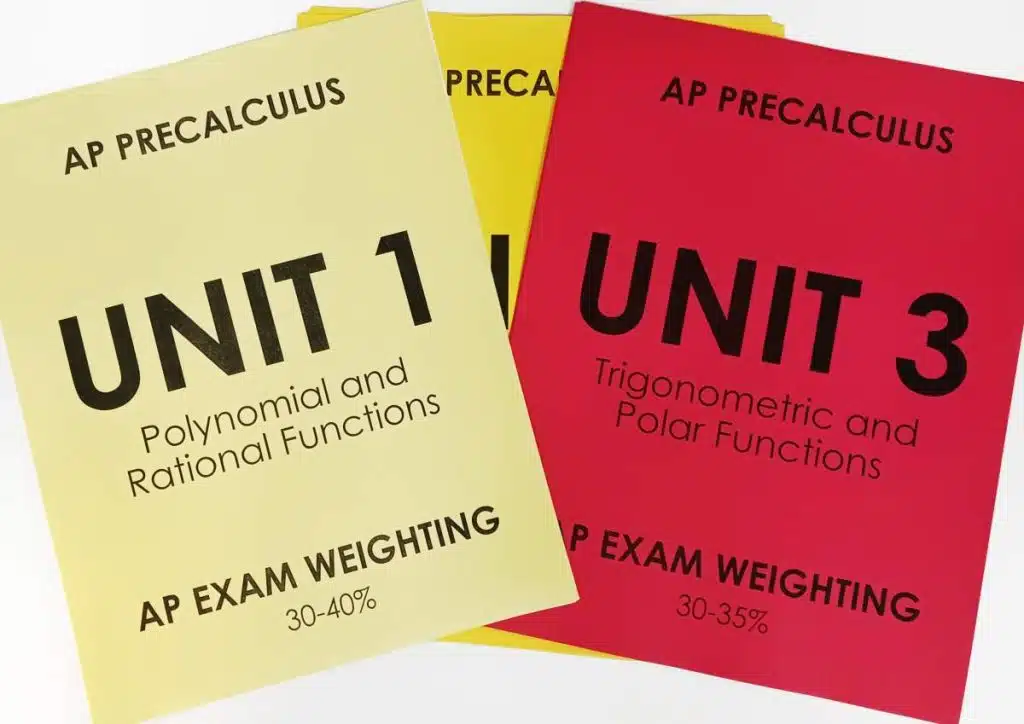 stacks of ap precalculus unit dividers printed on 3 different colors of paper 