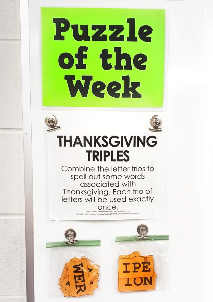 thanksgiving triples word puzzle hanging underneath green sign which reads "puzzle of the week." 