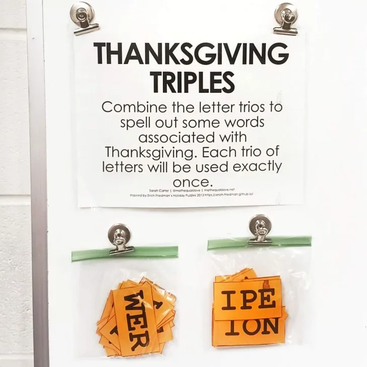 close up of thanksgiving triples word puzzle hanging on dry erase board in high school math classroom