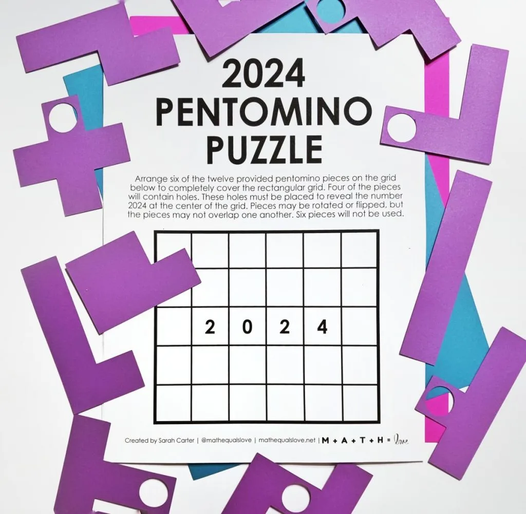 2024 pentomino puzzle with pentominoes pieces scatter around it. 