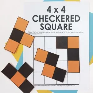 4 x 4 checkered square puzzle with pieces scattered on top.