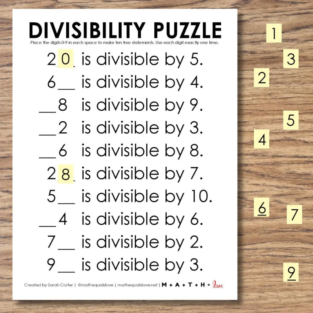 divisibility puzzle with moveable pieces. 