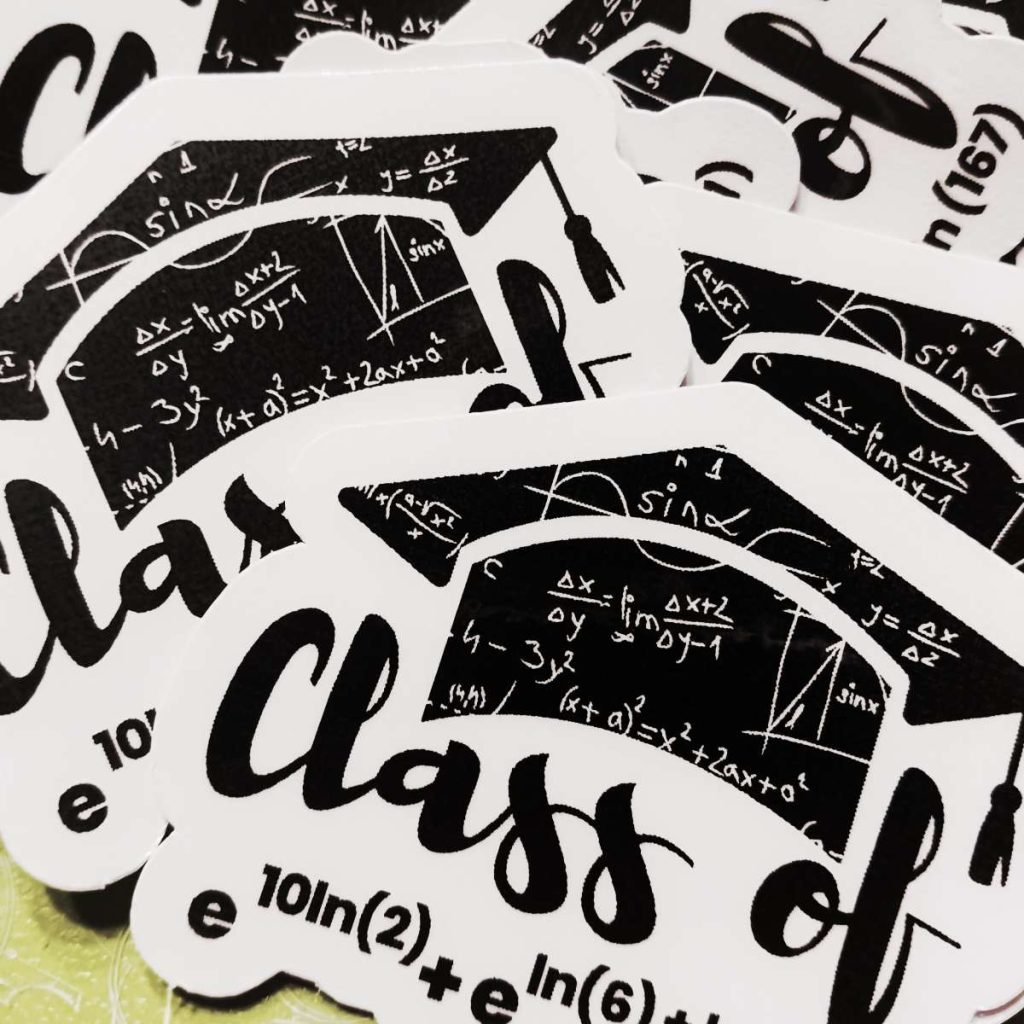 pile of precalculus graduating class stickers. 