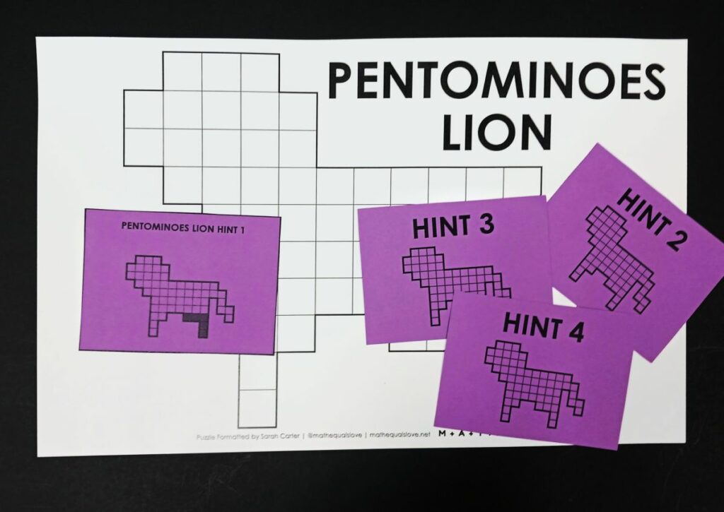 pentominoes lion puzzle with hint cards. 