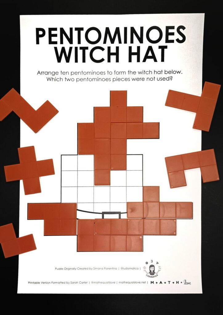 Pentomino Witch Hat Puzzle for Halloween partially solved.