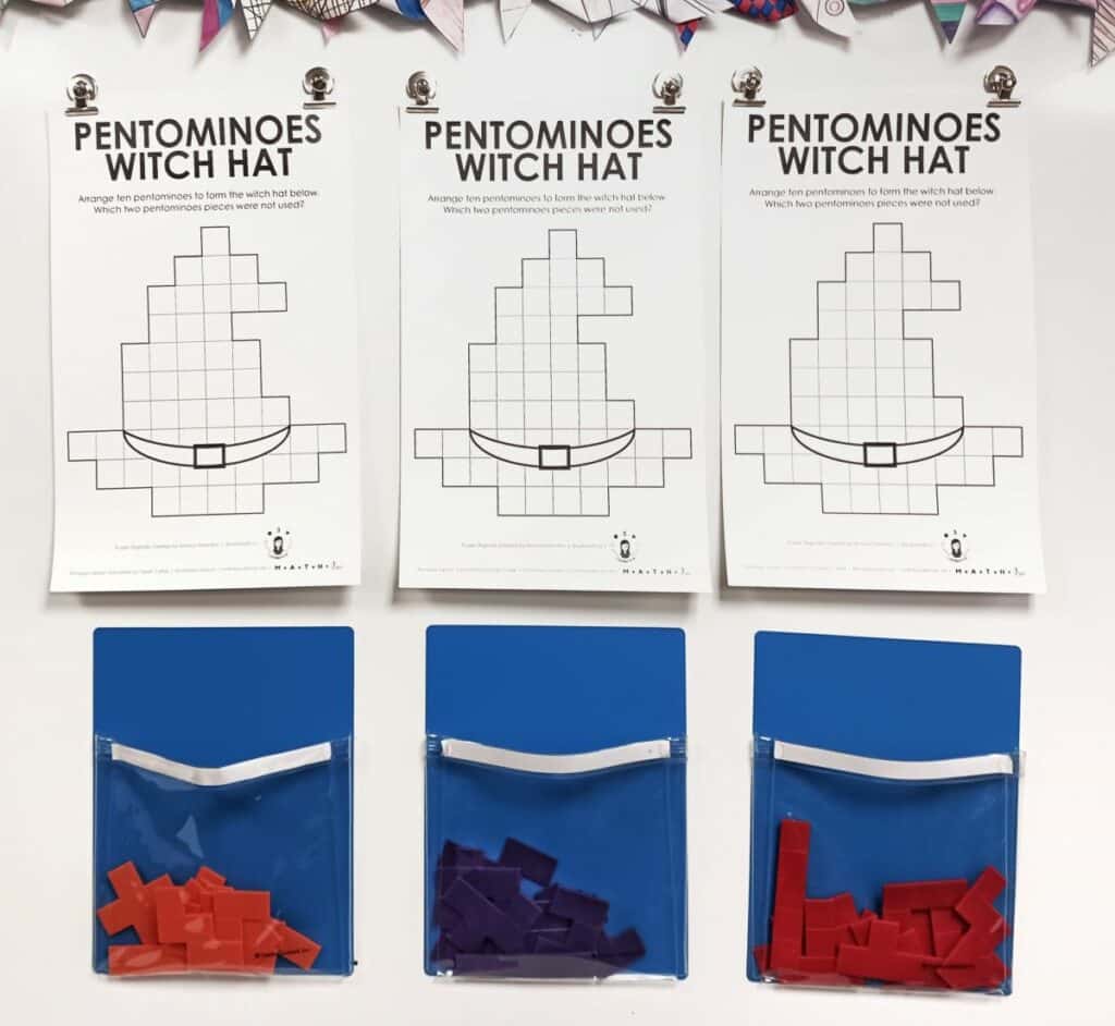 Pentomino Witch Hat Puzzle Hanging on Dry Erase Board for Halloween. 