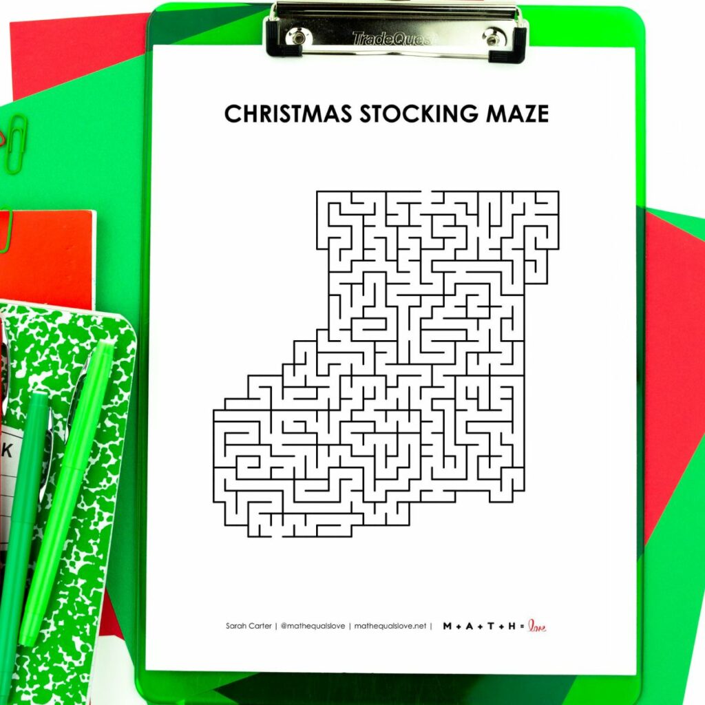 christmas stocking maze on clipboard. 