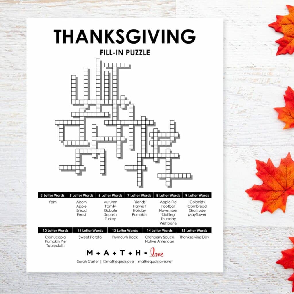 Thanksgiving Fill-In Word puzzle next to fall leaves. 