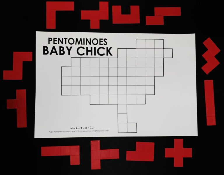 pentominoes baby chick puzzle with pentominoes spread around it.