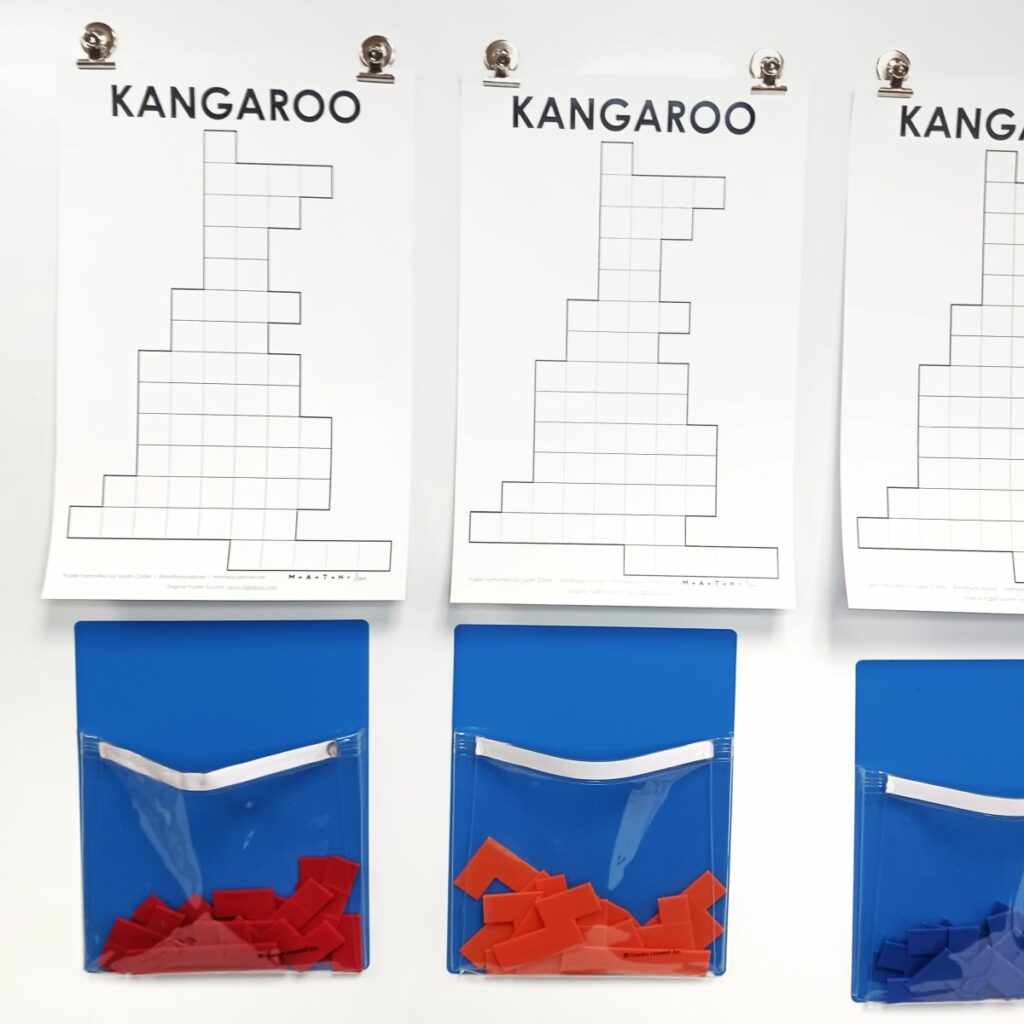 pentominoes kangaroo puzzle hanging on dry erase board in classroom. 