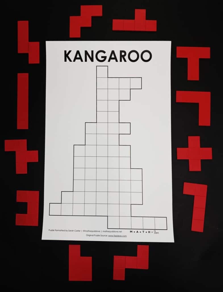 pentominoes kangaroo puzzle surrounded by red pentomino pieces. 