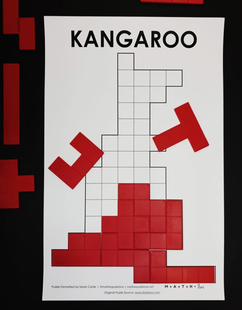 partially solved pentominoes kangaroo puzzle.
