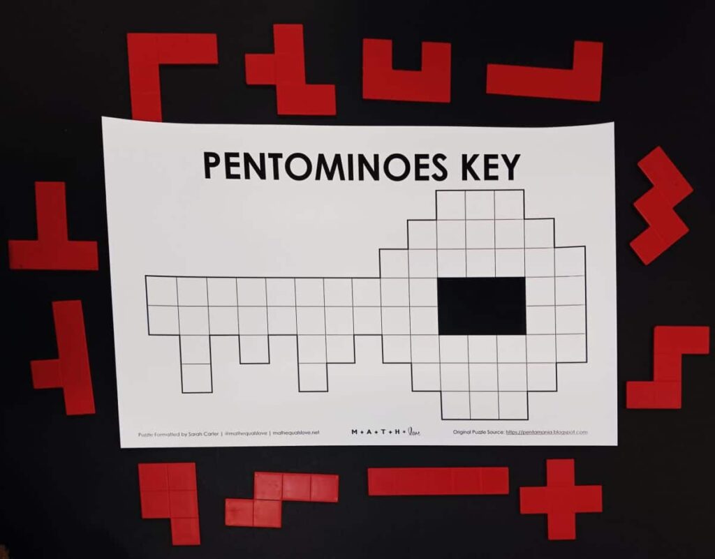 pentominoes key puzzle with pentominoes surrounding it.