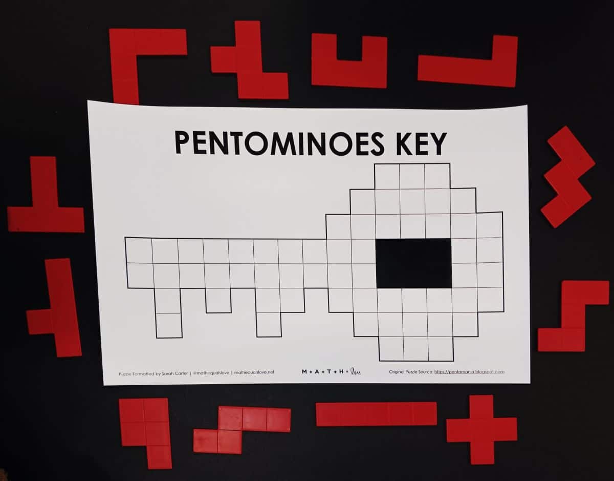 pentominoes key puzzle with pentominoes surrounding it.