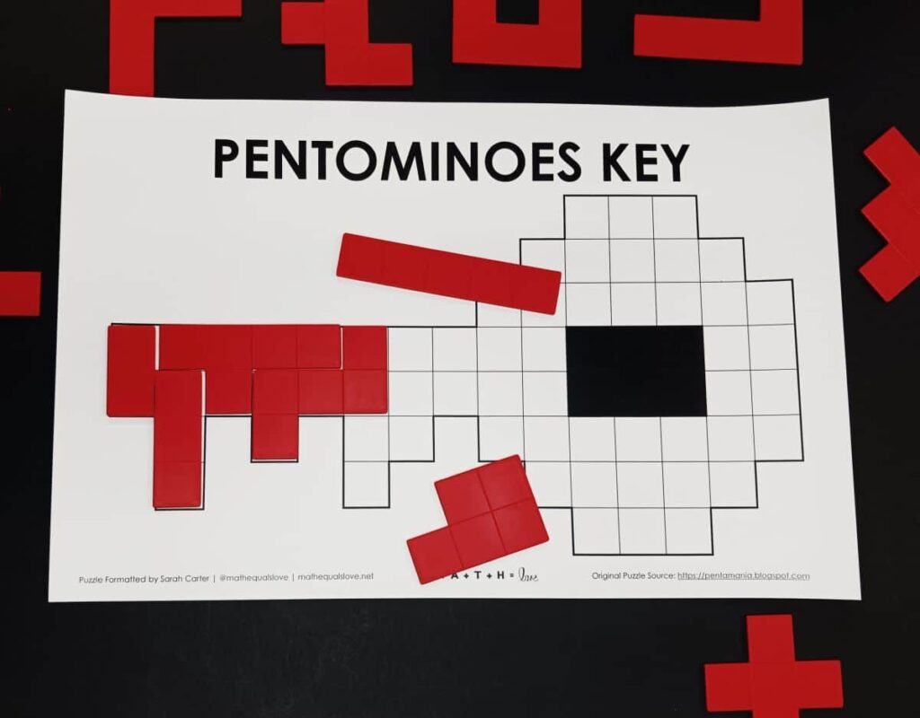 partially solved pentomino key puzzle.