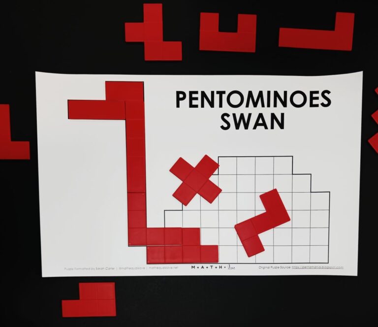 partially solved pentomino swan puzzle.