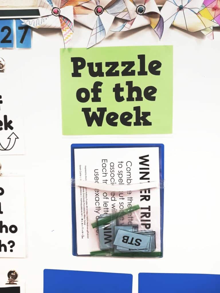 winter triples puzzle hanging under sign which reads "puzzle of the week" 