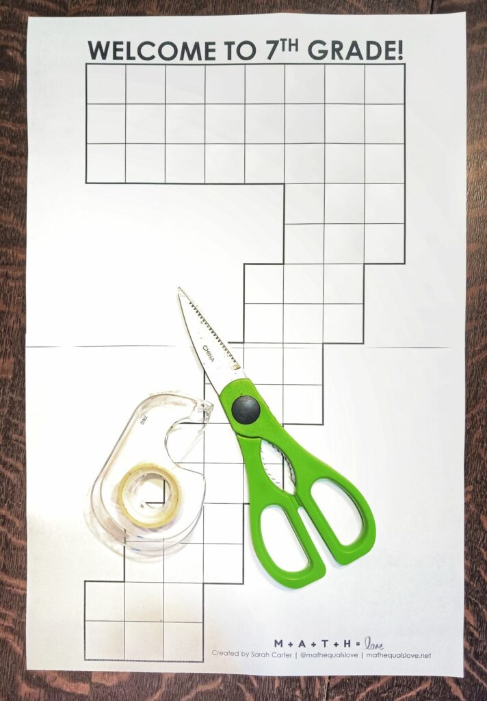 pentominoes printout with tape and scissors sitting on top. 