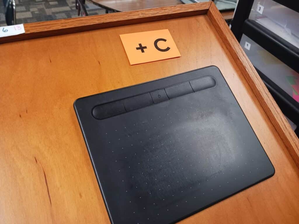 constant of integration reminder on podium above wacom tablet.