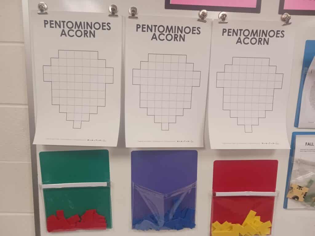 pentominoes acorn puzzles hanging in classroom.